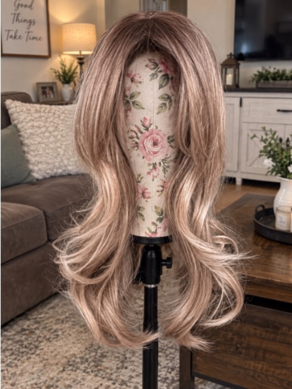 Long, layered and softly rooted blonde with face framing curls